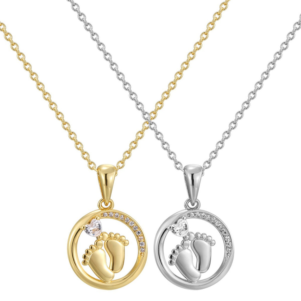 front view of gold and silver oval footprint necklaces