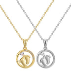front view of gold and silver oval footprint necklaces