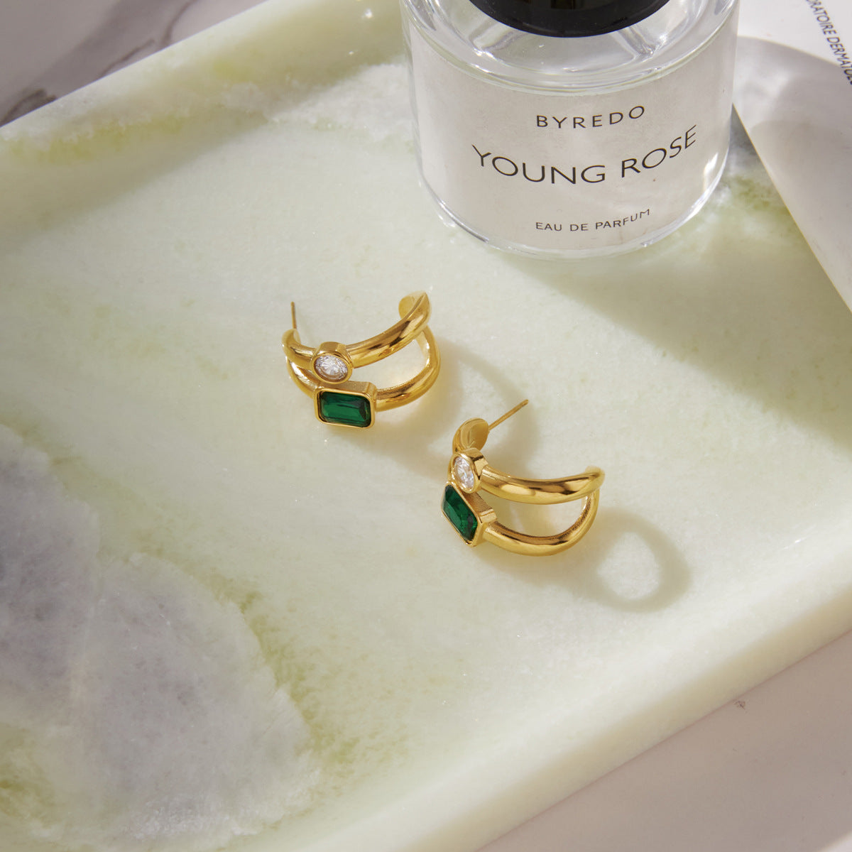 Open backs and stud posts of the double hoop earrings