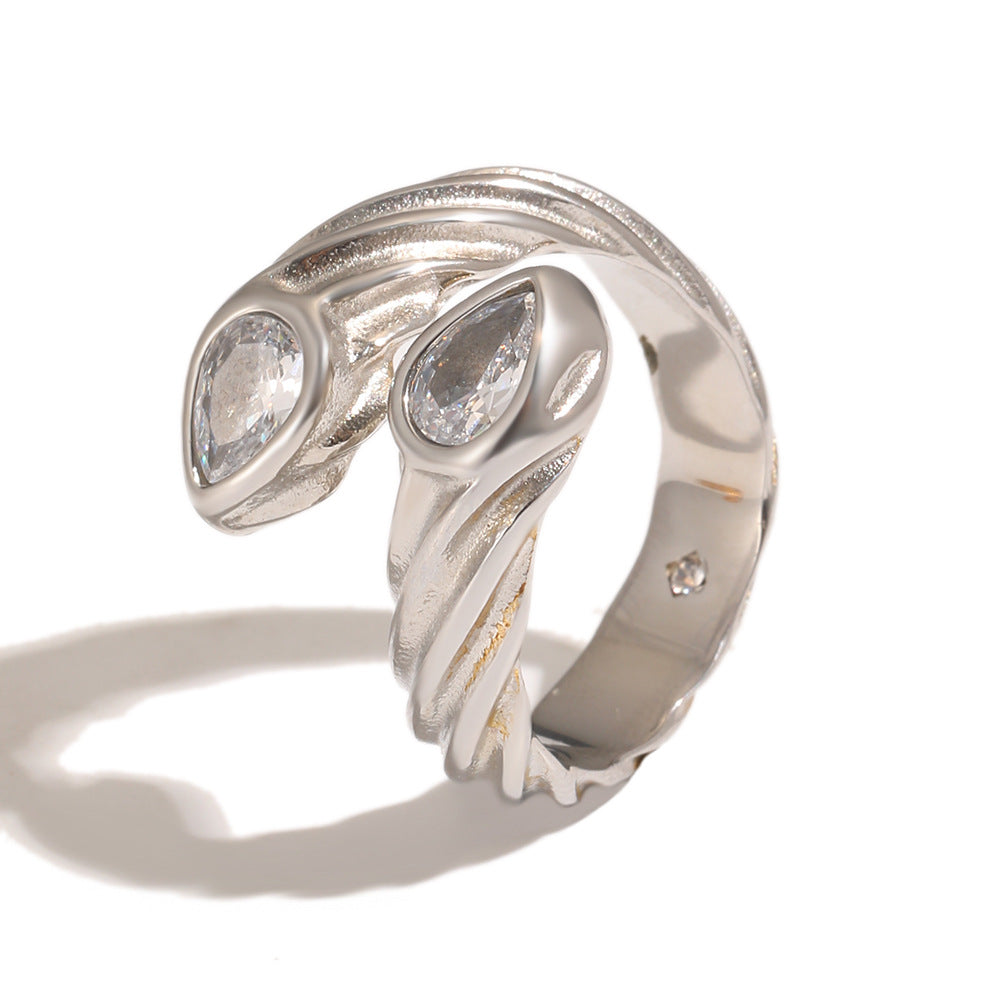 Silver-tone ring with paired pear-shaped settings
