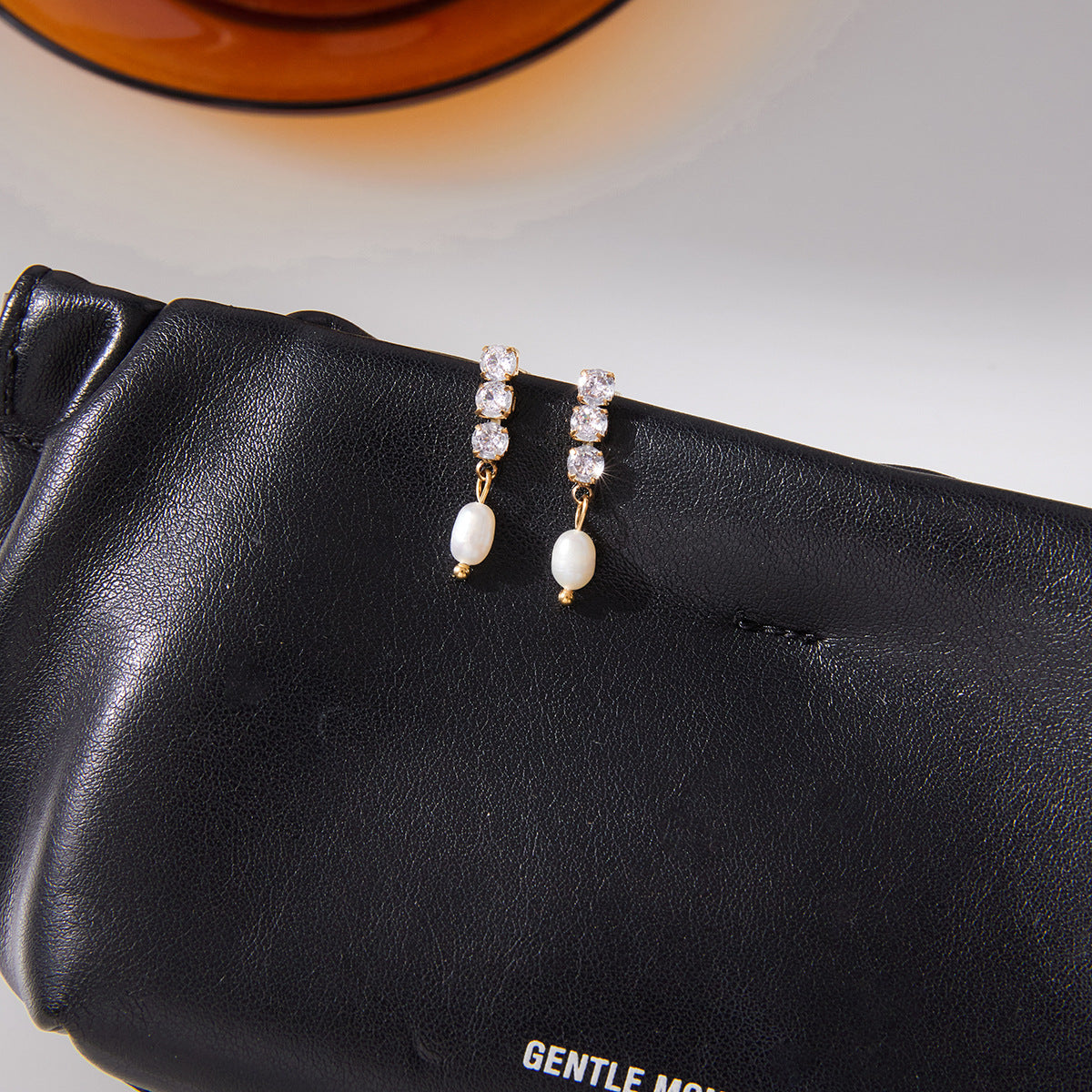 Wholesale Gold-Tone Stainless Steel Freshwater Pearl and Clear Stone Drop Earrings - side profile