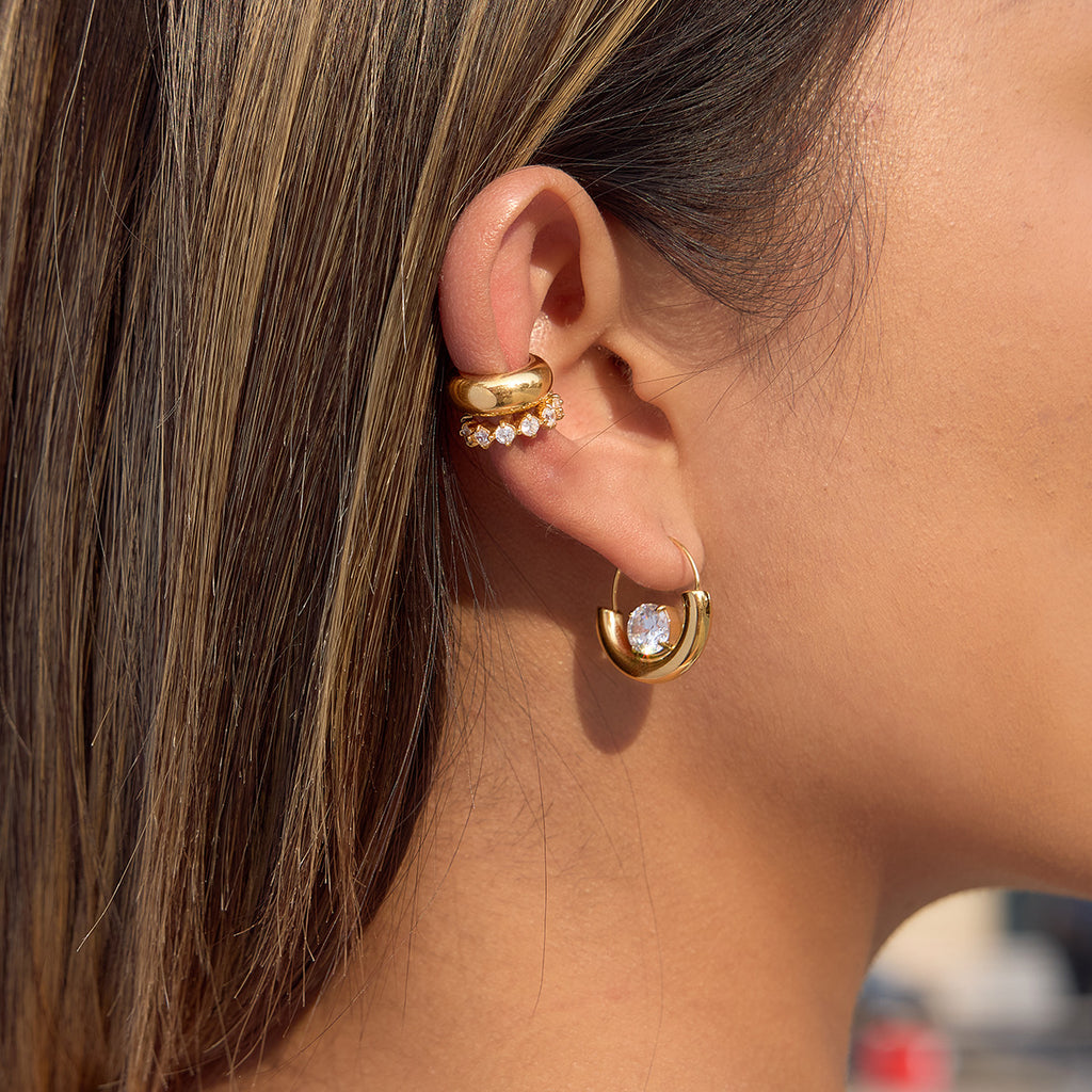 half-moon stone hoop earrings shown with a matching ear cuff