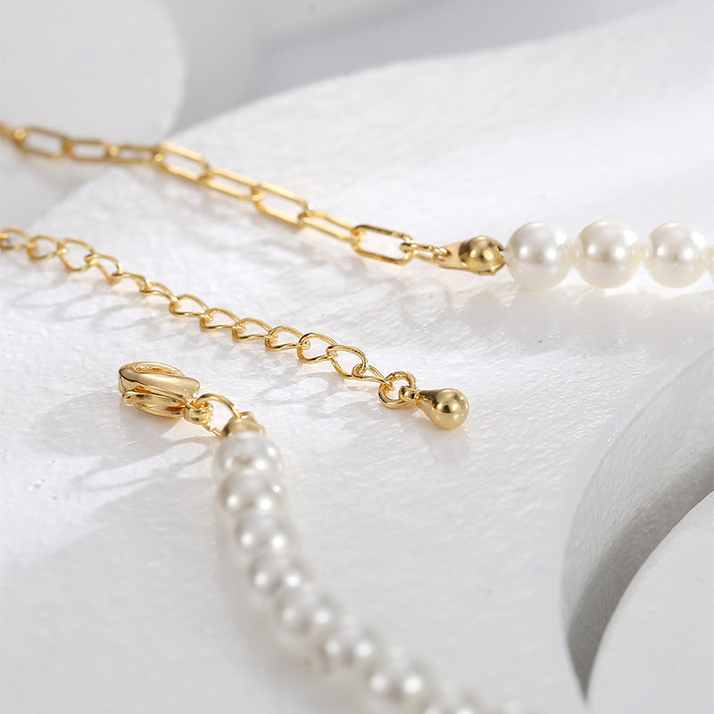 lobster clasp and extension chain on the asymmetrical beaded necklace