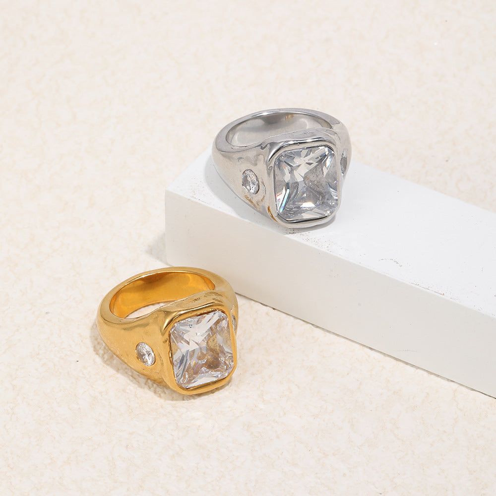 gold plated and silver-finish signet rings viewed from the side