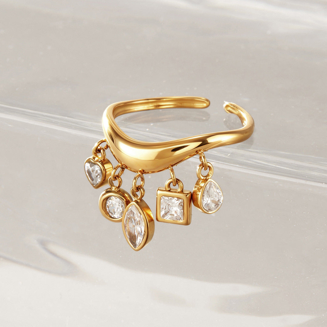 Side view of the five-charm stainless steel ring