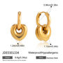Gold heart charm hoops shown with size guide