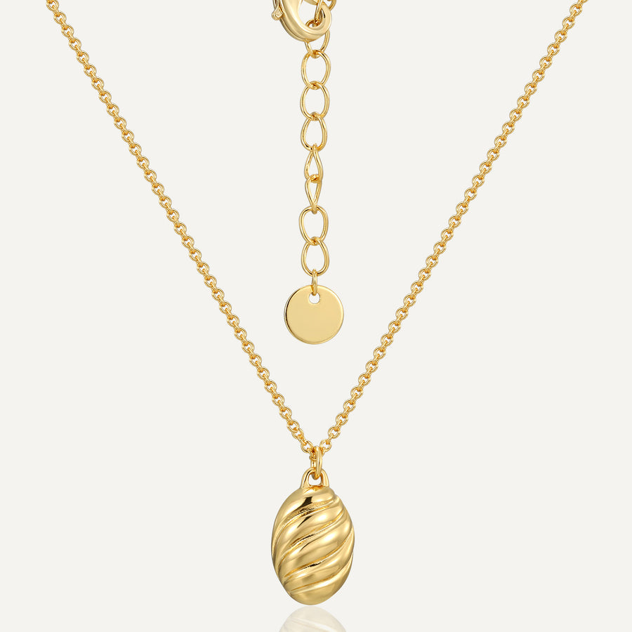 gold plated brass ribbed oval pendant necklace with extension chain