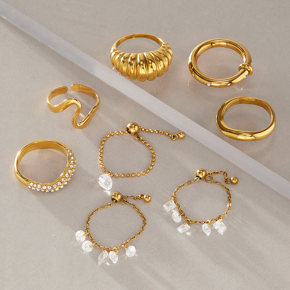 Chain and sculpted rings arranged in rows