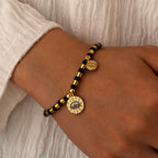 model wearing the gold plated lapis lazuli evil eye bracelet