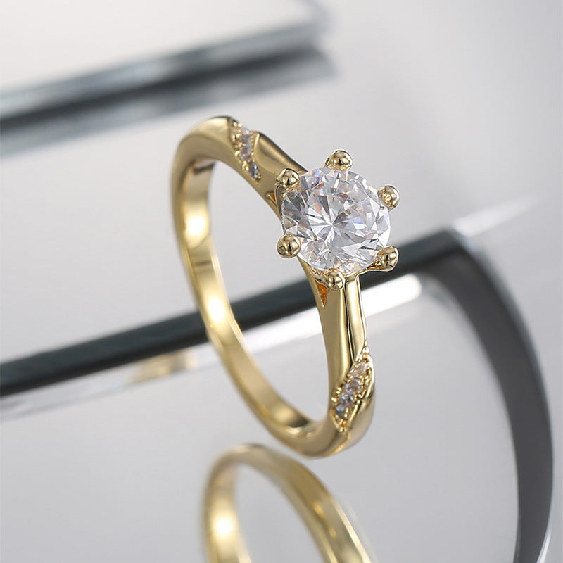 front angle of round zirconia solitaire ring on reflective blocks