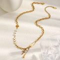 gold plated cross and star charm necklace with white bead stations