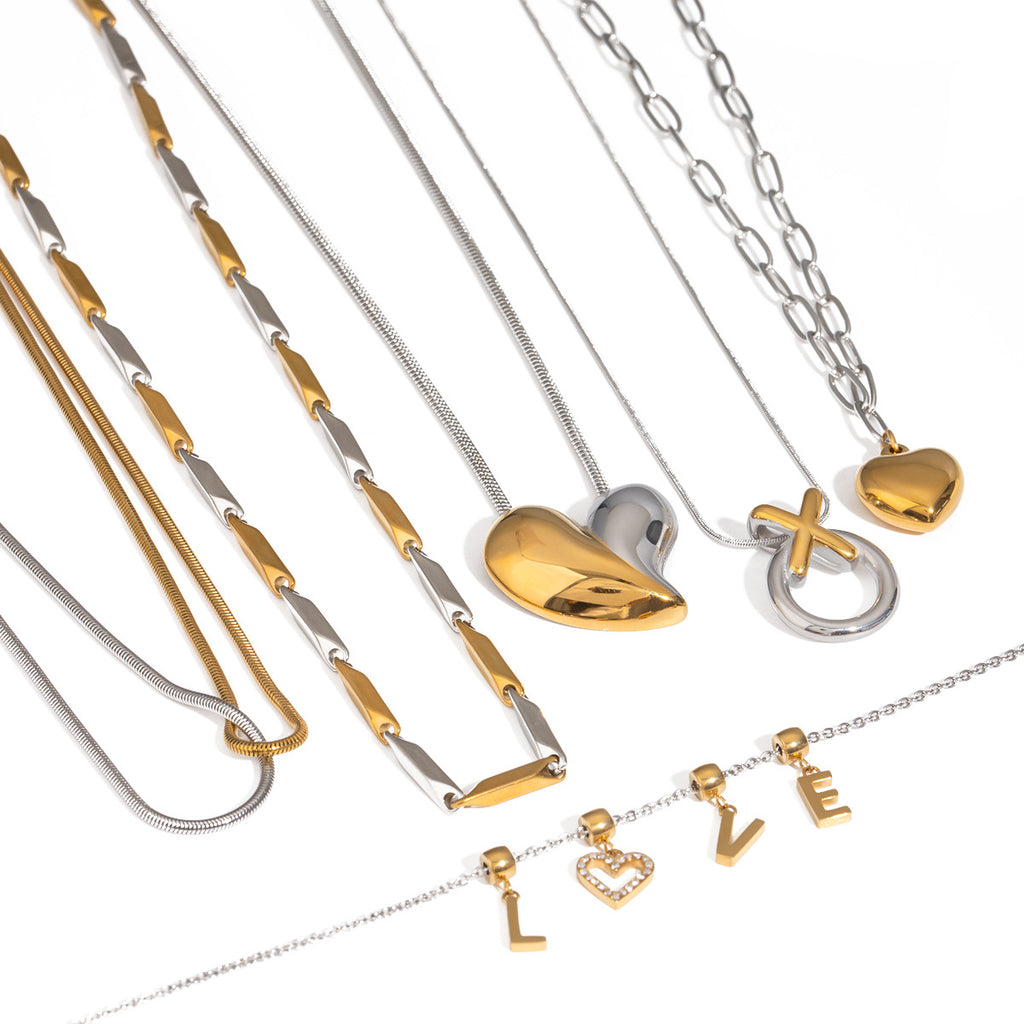 Mixed-Finish Stainless Steel Heart Necklace Collection finish and shape detail