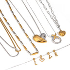 Mixed-Finish Stainless Steel Heart Necklace Collection finish and shape detail