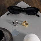 Both oval ring finishes in a tabletop arrangement