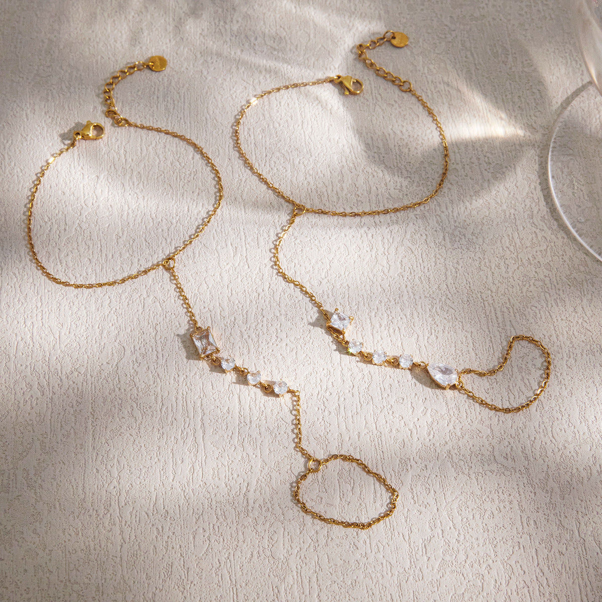 Two hand chain designs displayed on fabric