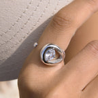 Steel color open ring shown close-up