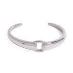 Polished cuff with a small central open detail