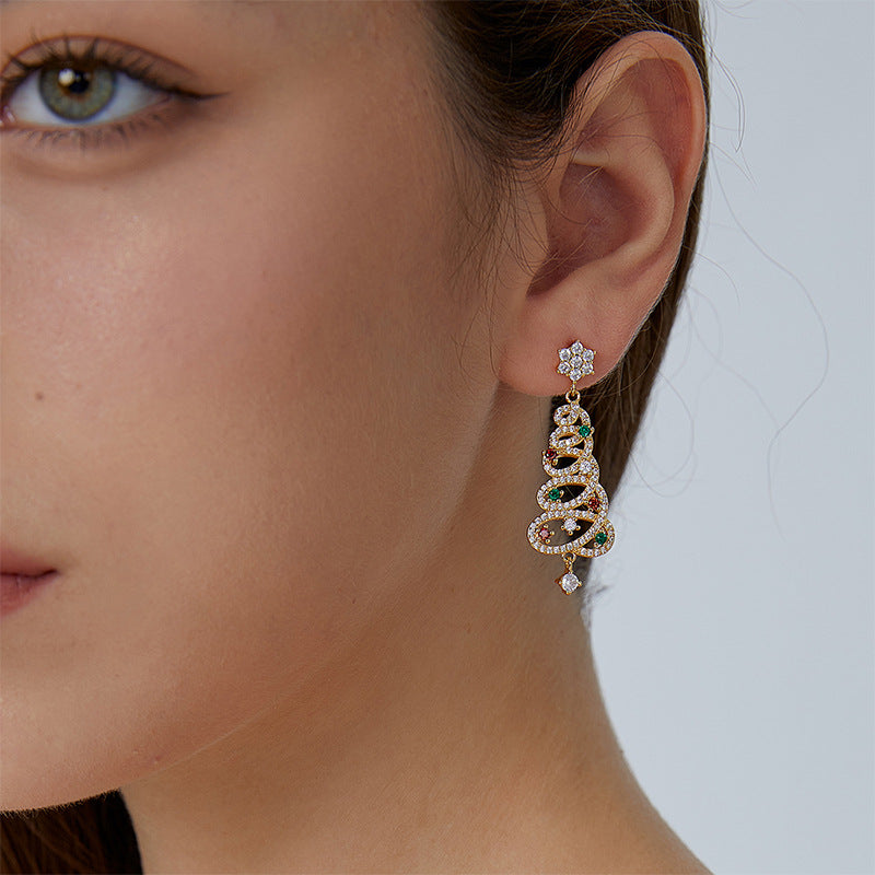 Looped Christmas tree drop earrings shown worn