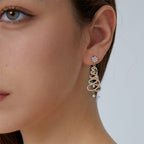 Looped Christmas tree drop earrings shown worn