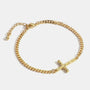 gold plated brass cross curb chain bracelet on white