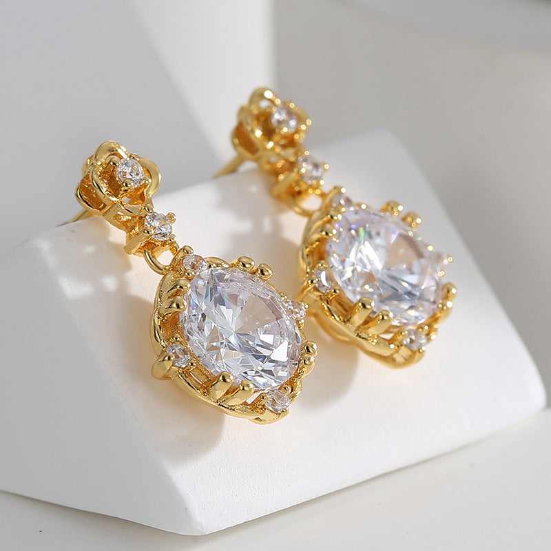 clear round zirconia drops with petite flower-shaped posts