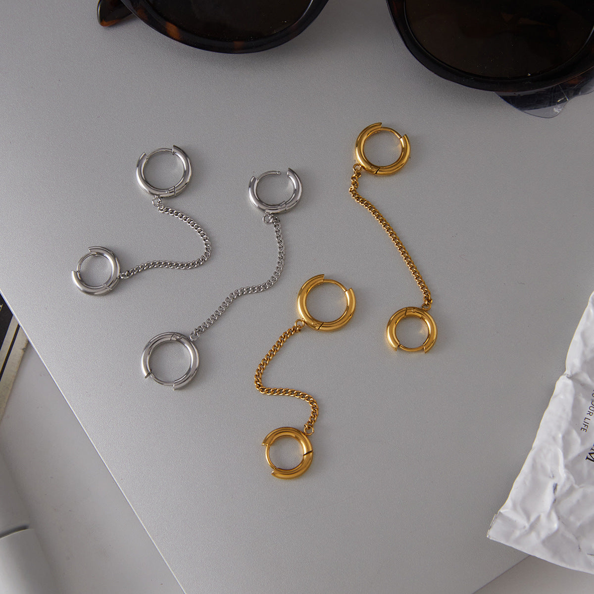 gold plated and silver-finish chain connector earrings together