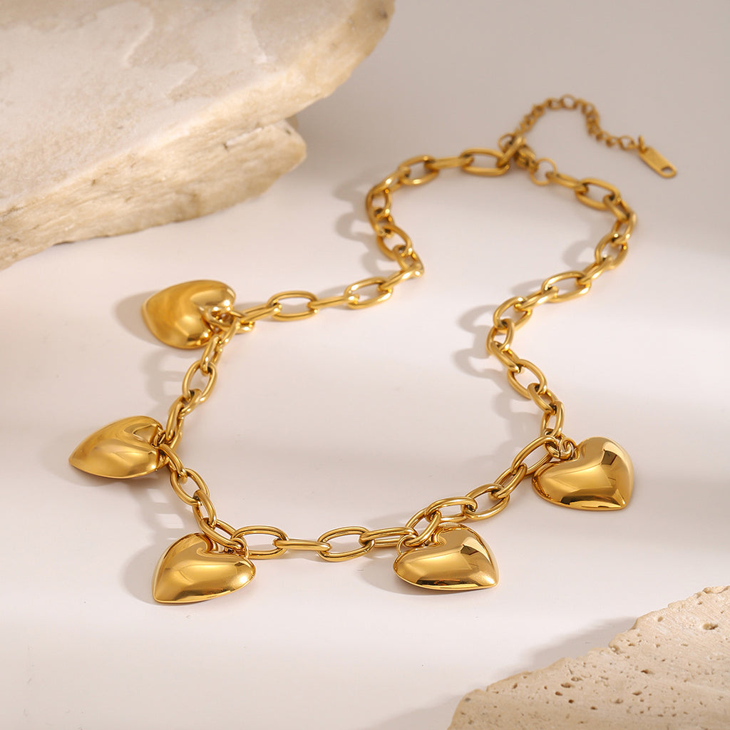 Gold-Tone Puffed Heart Stainless Steel Charm Necklace styled product view