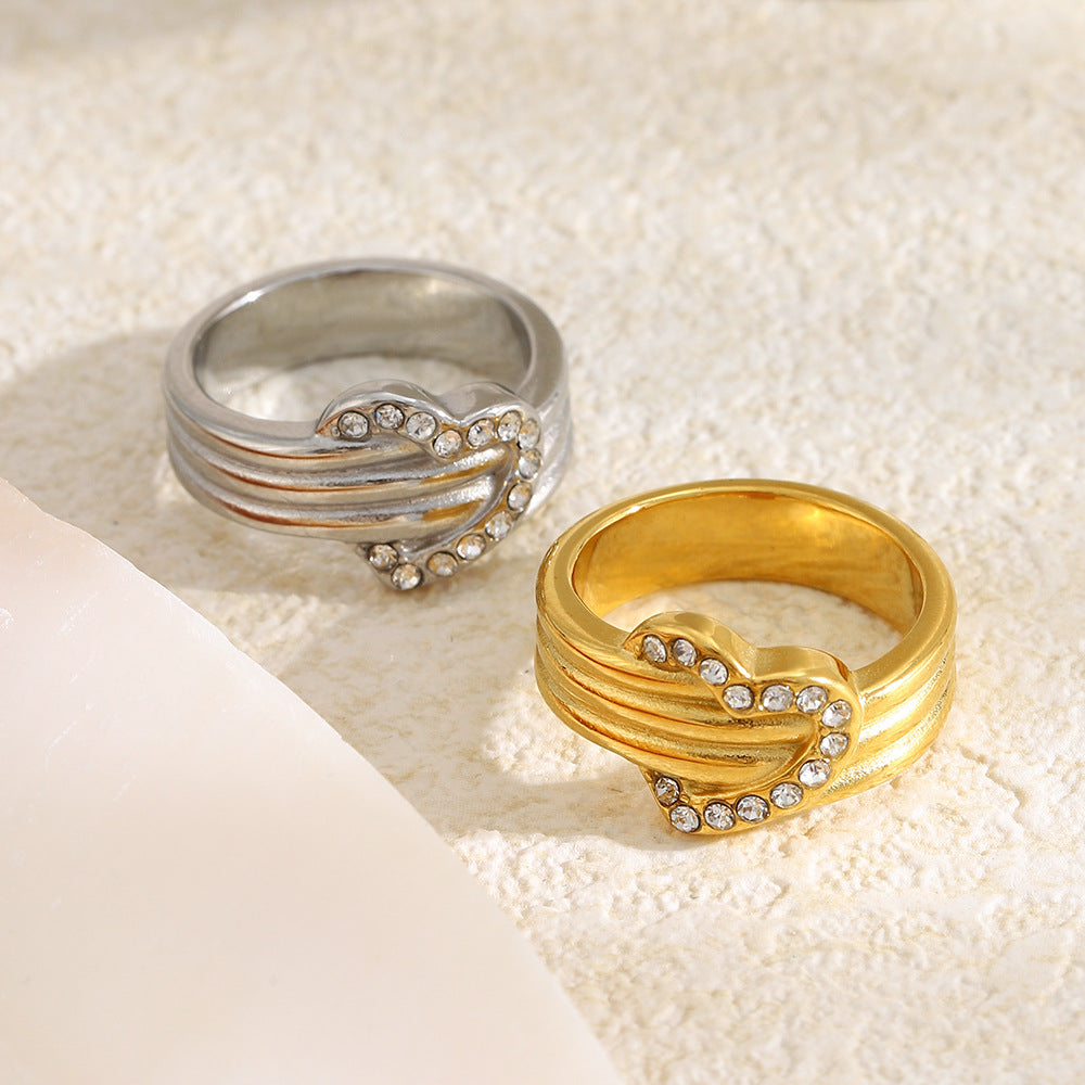 gold plated and silver-finish stainless steel pavé heart rings
