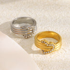 gold plated and silver-finish stainless steel pavé heart rings