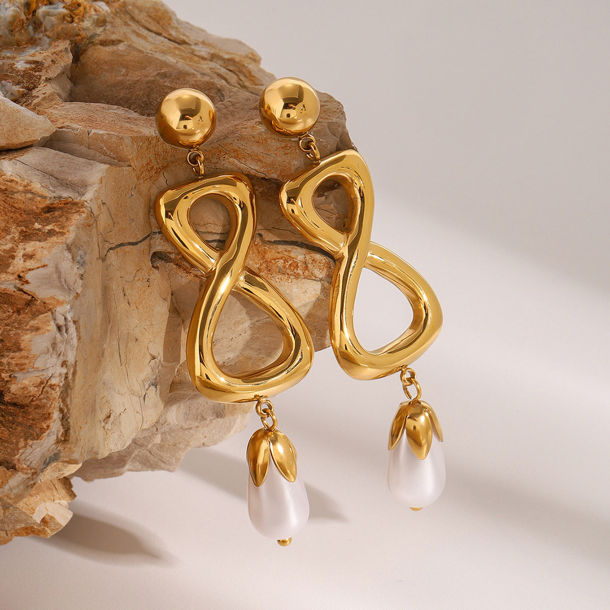 Gold-Tone Pearl-Look Infinity Stainless Steel Drop Earrings close-up product view