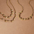 Three coastal necklaces with different marine charm arrangements