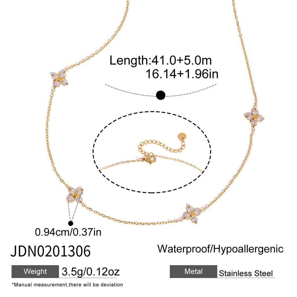 Gold tone butterfly station necklace with clasp detail