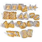 Geometric earring assortment showing star, triangle and textured styles