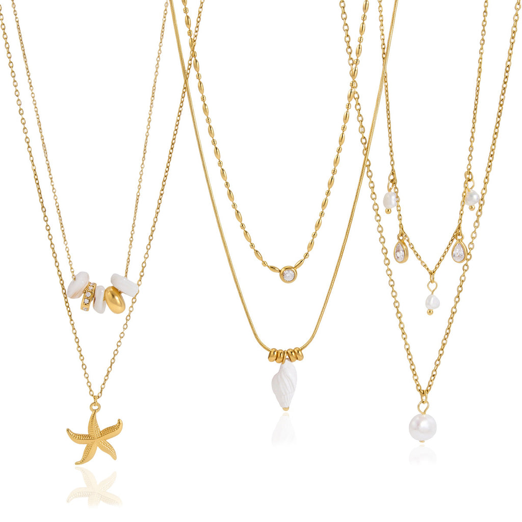 Full view of shell starfish and pearl-look layered necklaces