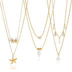 Full view of shell starfish and pearl-look layered necklaces