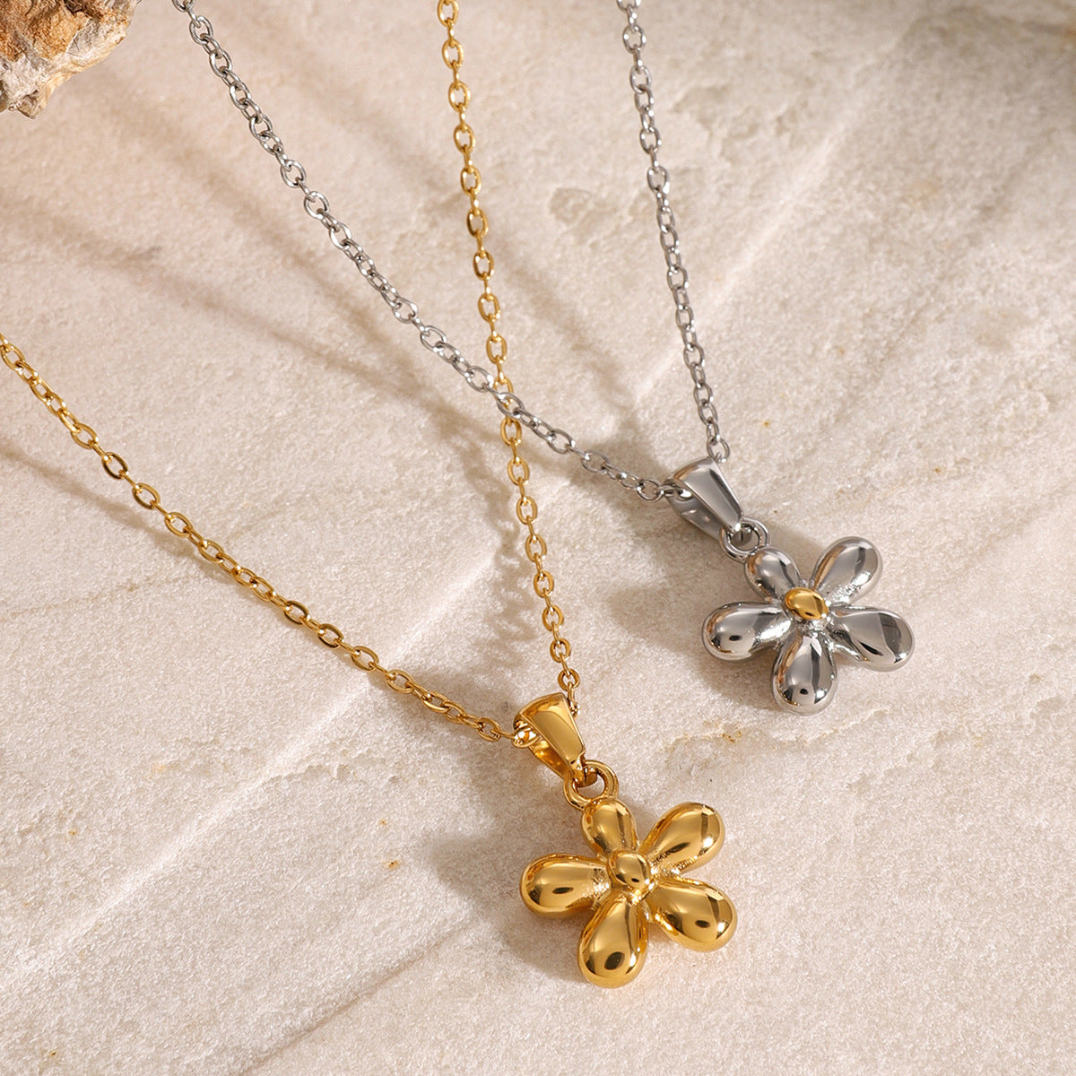 Polished stainless steel flower pendant necklaces in gold and silver tones