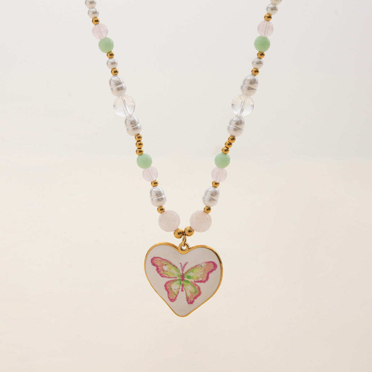 Gold-Tone Butterfly Heart Stainless Steel Necklace Collection – close-up view