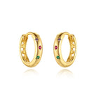 isolated pair of 925 silver huggies with multicolor zirconia stars