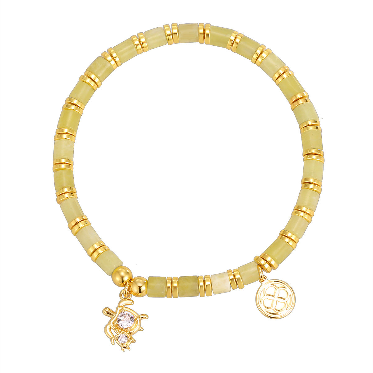 isolated sea turtle charm bracelet with gold plated ring spacers
