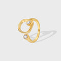 gold plated brass open ring with offset square frame and clear stones