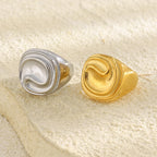 gold plated and silver finish sculptural ripple signet rings