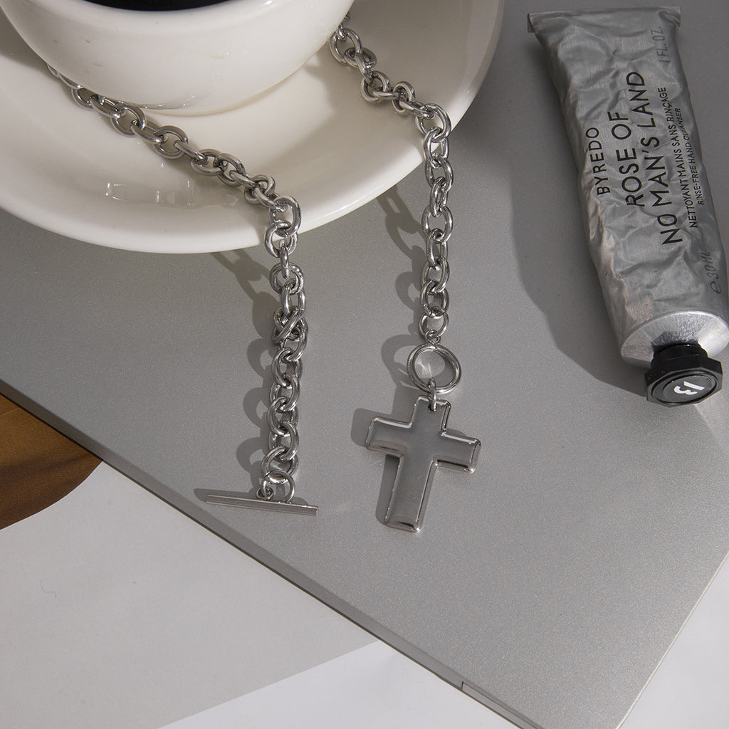 gold plated and silver-finish cross toggle necklaces together
