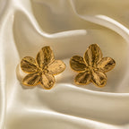 Textured four-petal stainless steel stud earrings