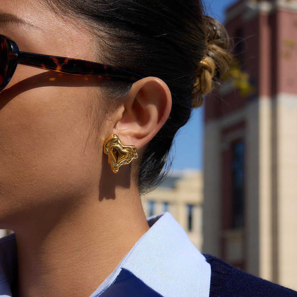 Gold-Tone Sculptural Heart Stainless Steel Stud Earrings styled product view
