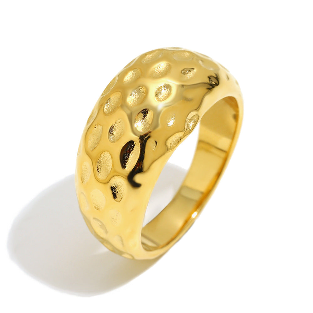 isolated gold plated stainless steel hammered dome ring