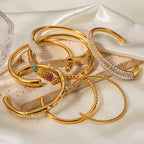 Open stainless steel cuff bracelet collection display