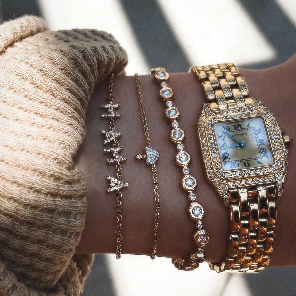 Mama motif stainless steel bracelets layered with a watch