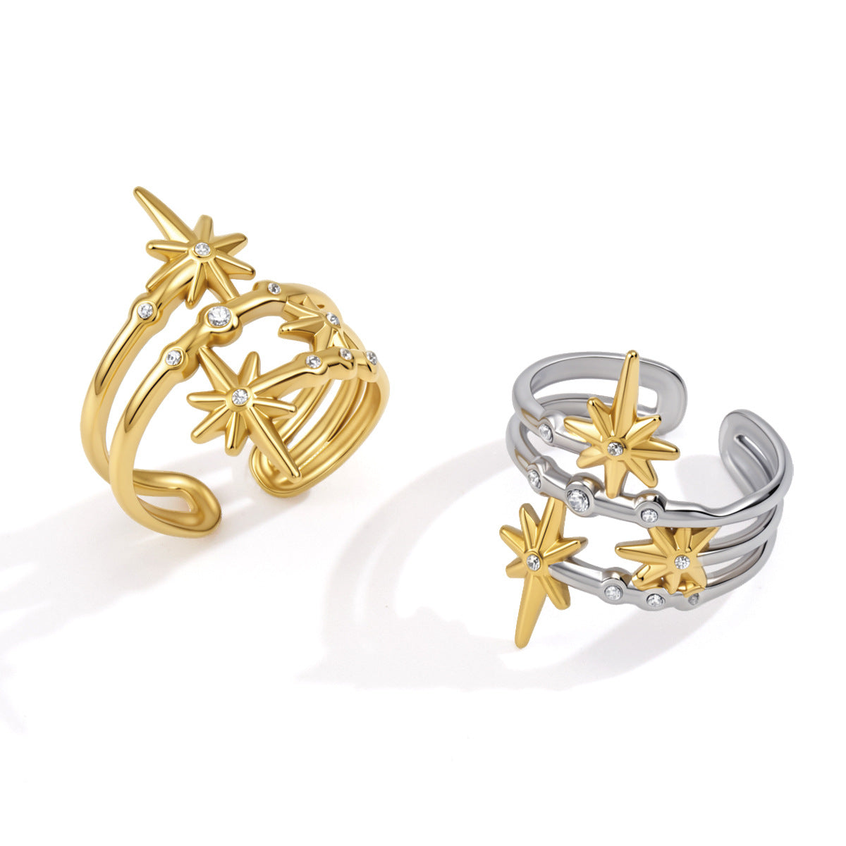 Gold and two-tone open rings showing layered star design