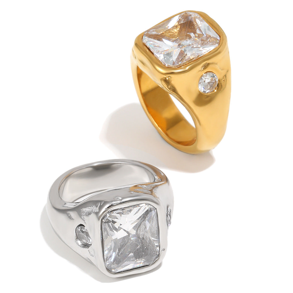 front view of cushion-cut clear stone signet rings