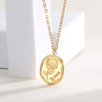 angled view of the raised rose relief pendant and fine chain